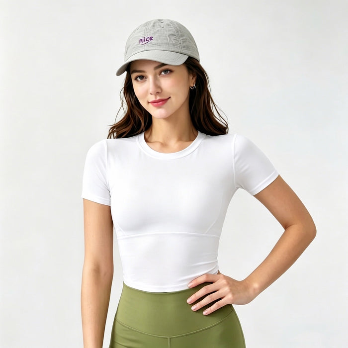 Model posing in a light grey ultralight cap, perfect accent for a gorpcore aesthetic look.