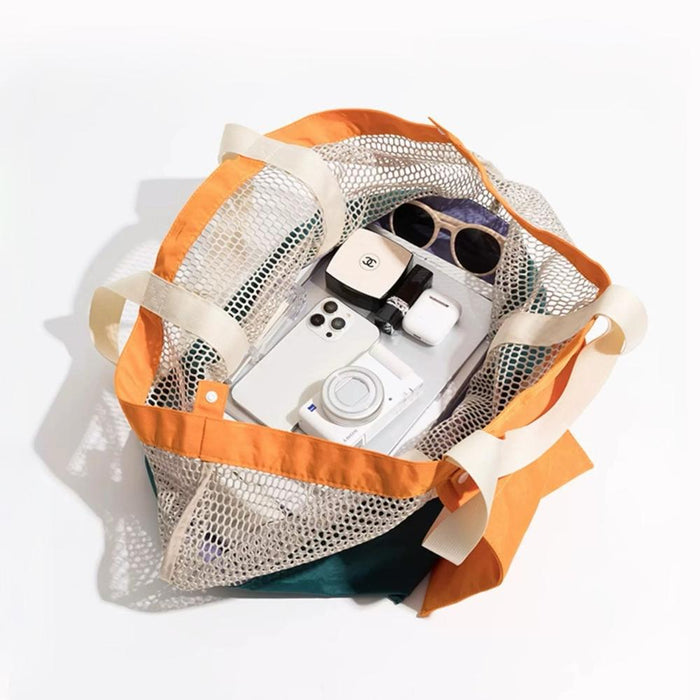 Interior view of the tote bag showing its spacious capacity for phone, glasses, and daily items.
