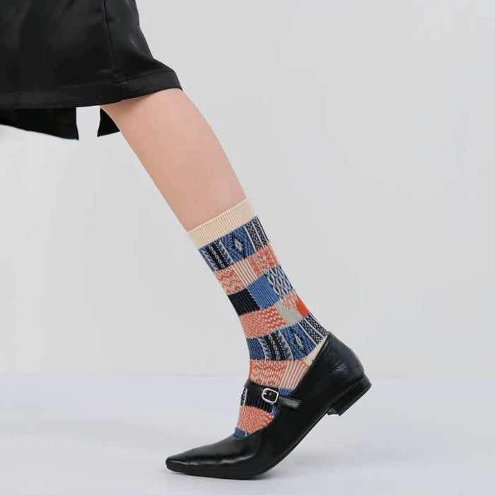 Model wearing a pair of Plaid Patchwork Socks in beige, easy to pack for travel and errands.