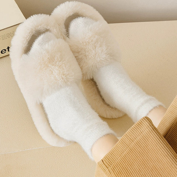 Model wearing a pair of white plush cozy socks, ideal for everyday outfits and sneakers.