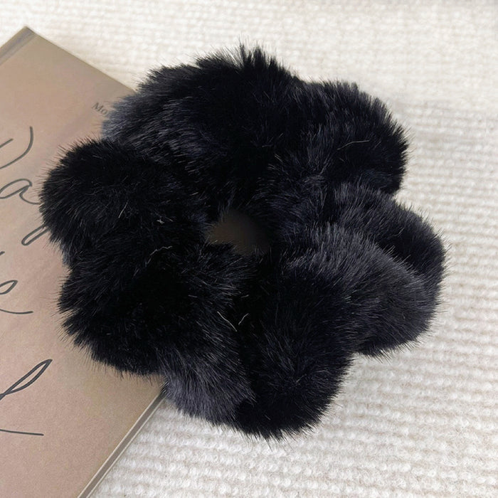 Front view of Plush Scrunchie in black, easy for workdays and special occasions.