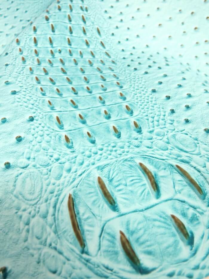 Poison Orange Mutant Ostrich Gator Embossed Vinyl Fabric / Sold By The Yard