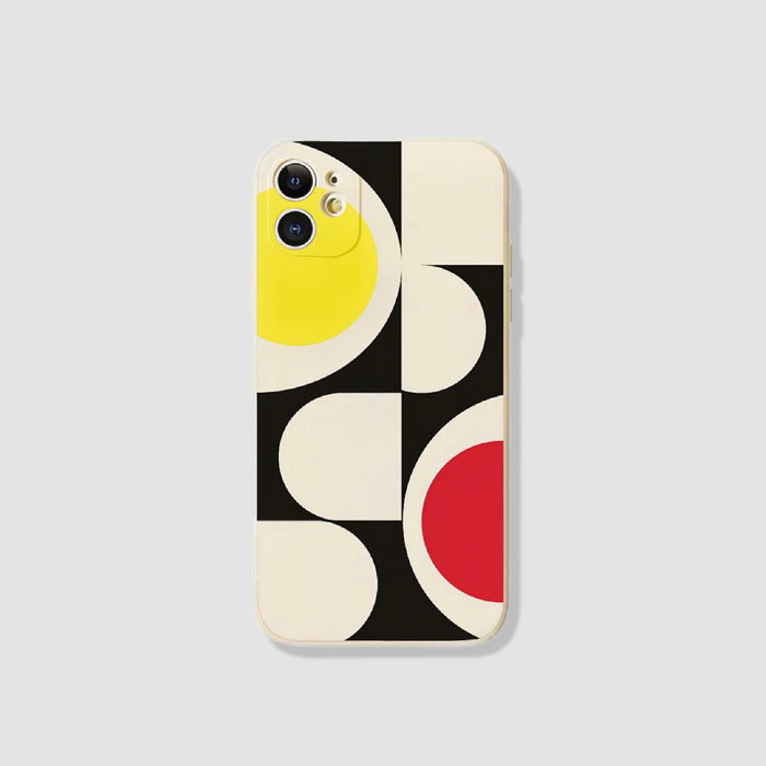 Silicone Pop Board case with black, cream, yellow, and red geometric 3D shapes. Sensory-toy design.