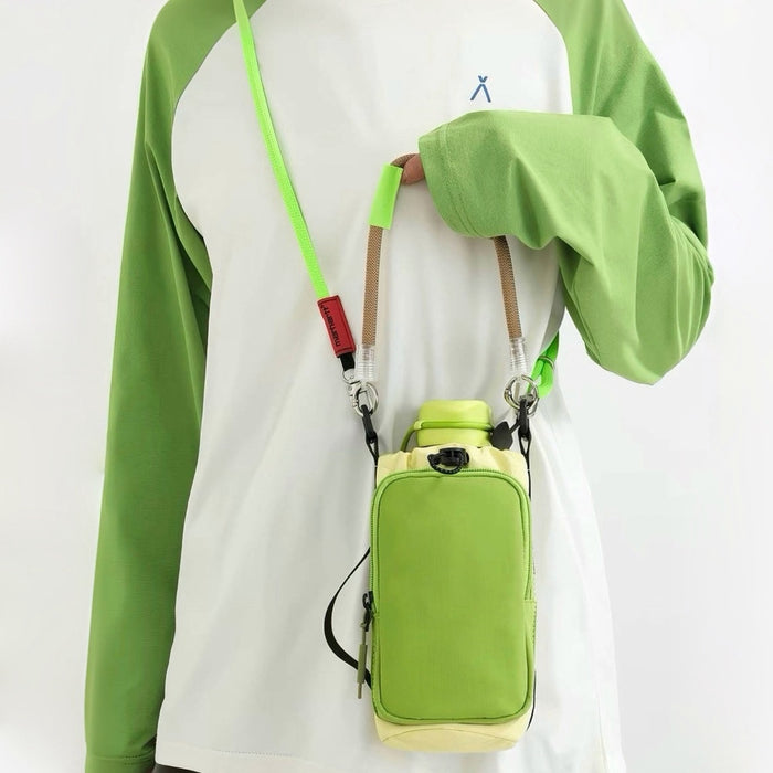 Model wearing a lime green sweatshirt displaying the vibrant green utility bottle carrier across the chest.