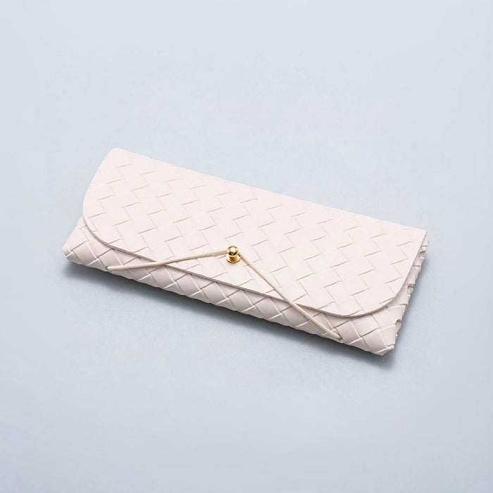 Folded view of white Portable Woven Leather Glasses Case with elastic rope closure, easy for travel packing.
