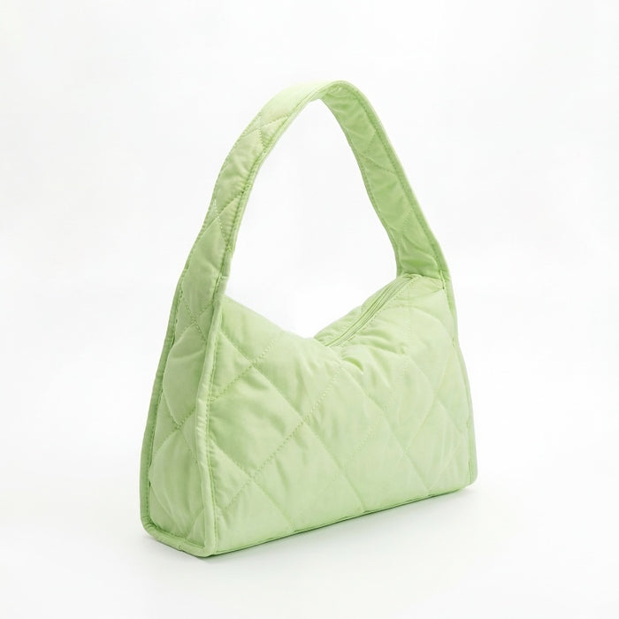 Side view of the lime green argyle quilted hobo bag with a cloud-like texture.