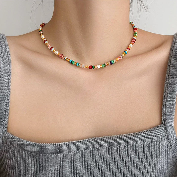 Model wearing a Rainbow Beads Necklace, ideal for layering.