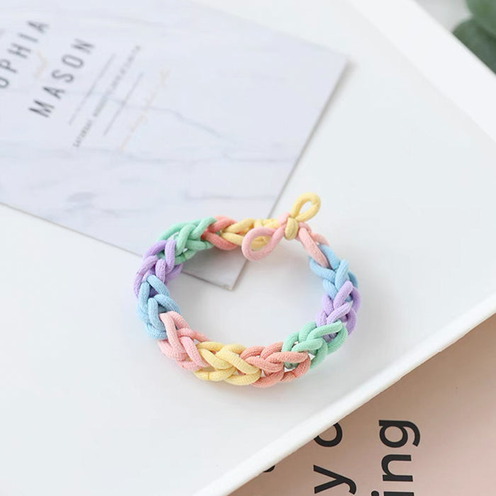 Flat lay of Rainbow Hair Ring hair accessory in cream, great for everyday styling and gifting.