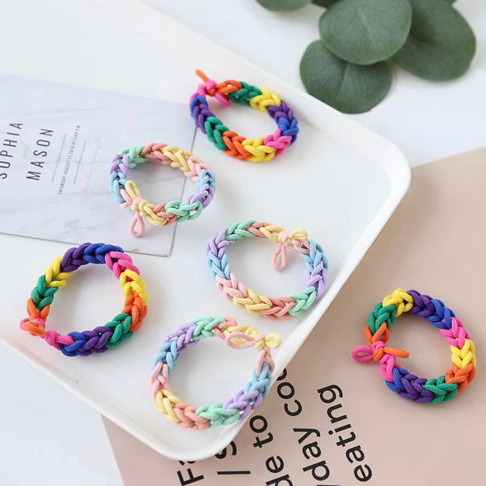 Six colors of Rainbow Hair Ring on the table, ideal for quick updos and ponytails.