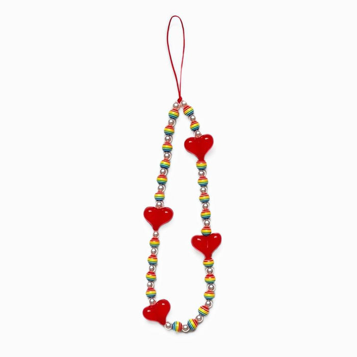 Front view of Rainbow Heart Phone Charm with red hearts and rainbow-striped beads.