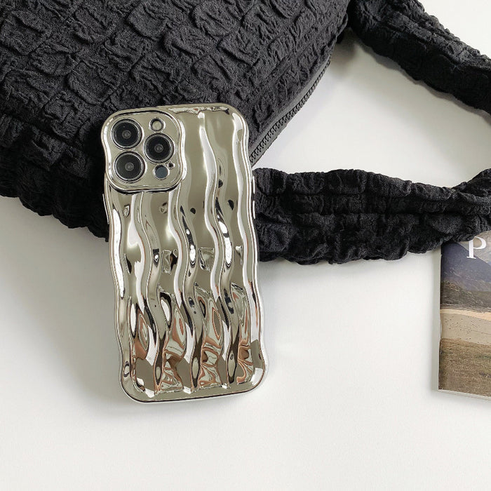 Detailed view of the metallic silver wave phone case.