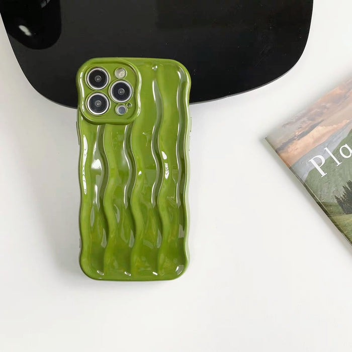 Detailed view of the green wave phone case.