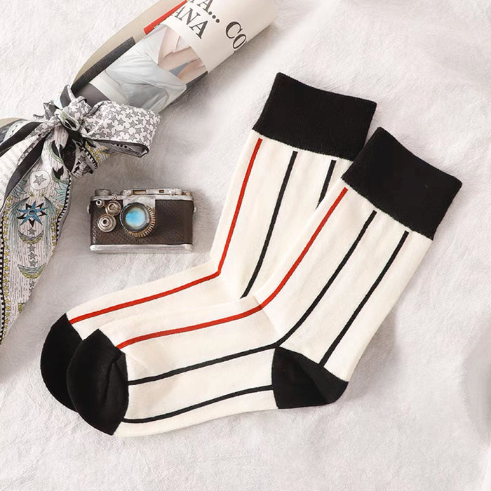 Close-up of Red Stripe Socks, easy to pack for travel and errands.