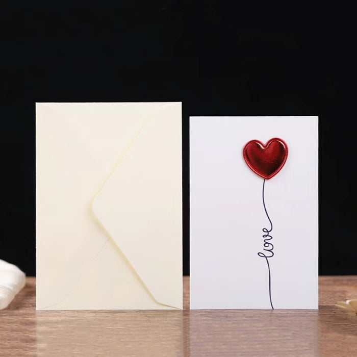 Close-up of embossed Red Love Card,  perfect for gifting.
