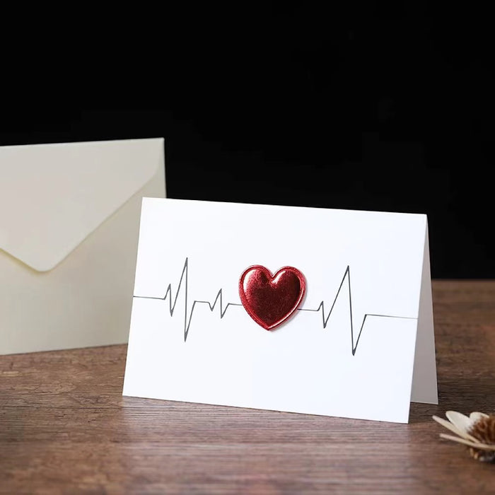 Flat lay of embossed Red Love Card, perfect for gifting.