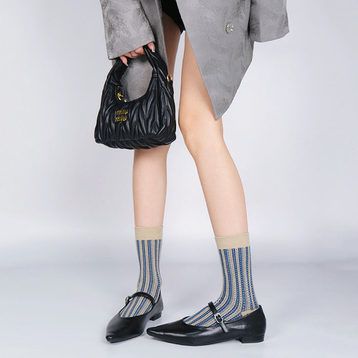 Model wearing a pair of Rocky Stream Socks, great for casual wear and light workouts.