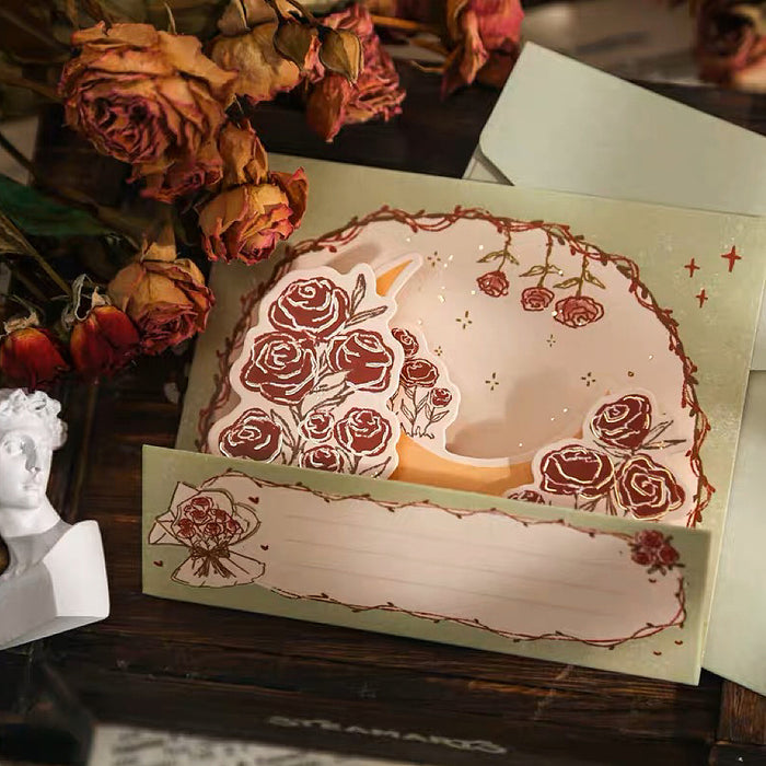 Close-up of Rose Poetry Greeting Card in moon pattern.