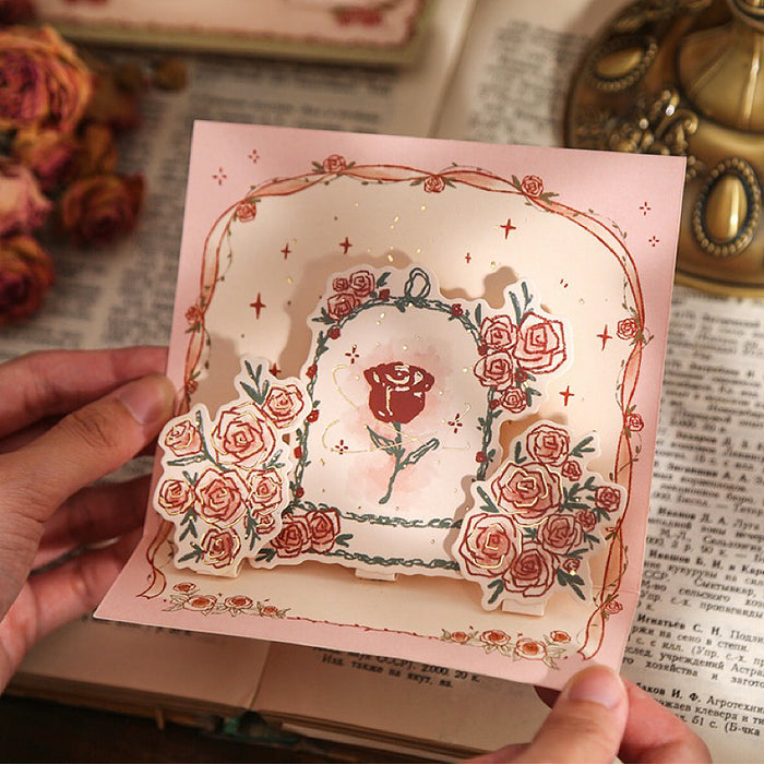 Model Hands holding a  Rose Poetry Greeting Card with roses pattern.