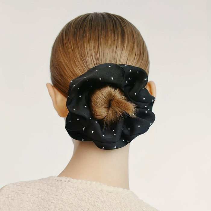Model wearing Satin Scrunchie With Rhinestones in black, easy for workdays and special occasions.