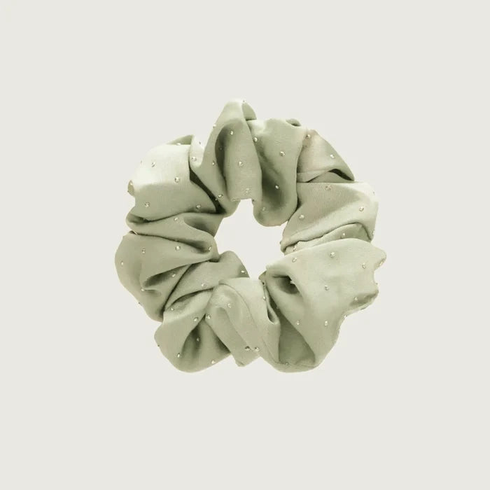Folded view of Satin Scrunchie With Rhinestones in sage green, ideal for quick updos and ponytails.