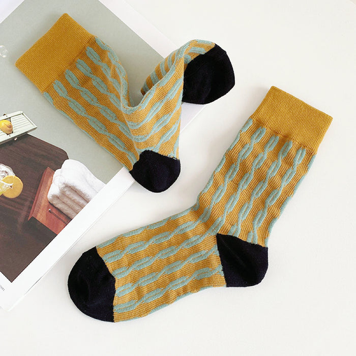 Angled view of Cotton Sculptured Ripple Knitted Socks in mustard yellow .