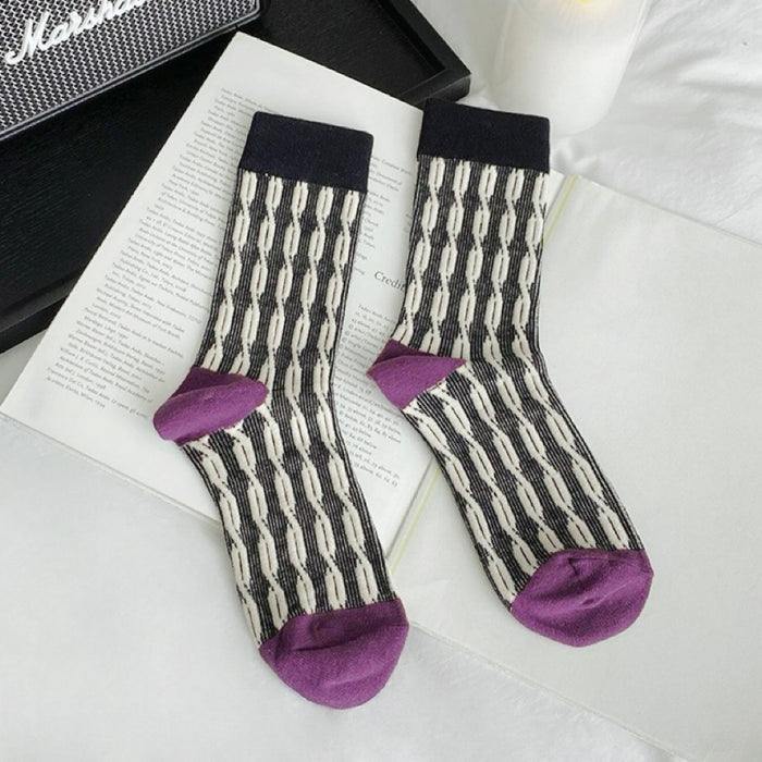 Front view of Sculptured Ripple Knitted Socks in black, easy to pack for travel and errands.