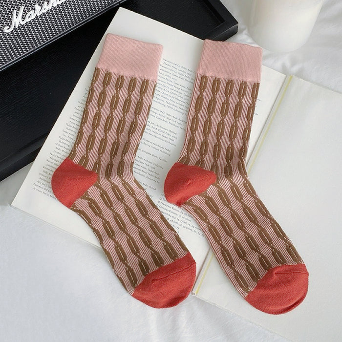 Close-up of Sculptured Ripple Knitted Socks in pink, ideal for workouts and commuting.