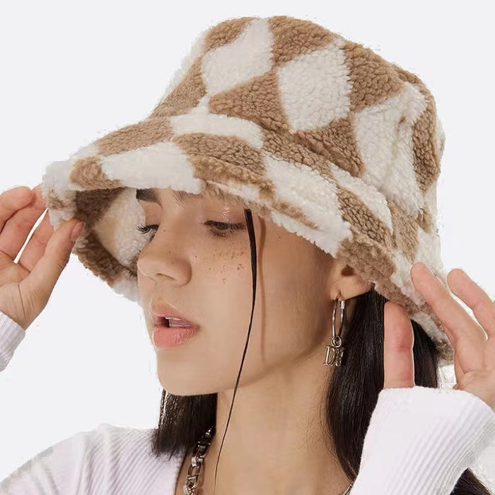 Side view of Model wearing Sherpa Diamond Check Bucket Hat in khaki, showcasing the textured insulating sherpa.