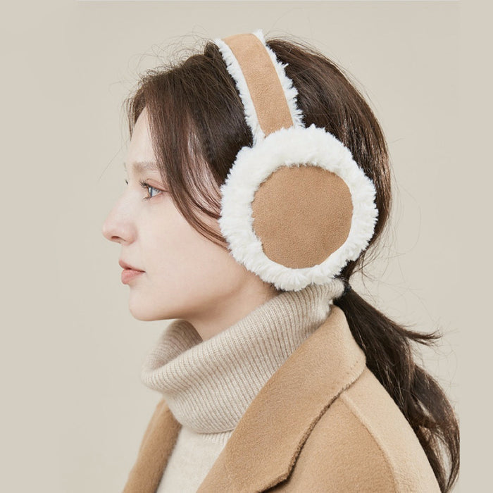 Model wearing  Sherpa Earmuffs, easy for gifting and photo-ready styling.