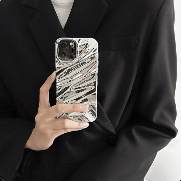 Model holding Silver Glossy Wave Case. Futuristic liquid-silver wave effect with a high-gloss finish.
