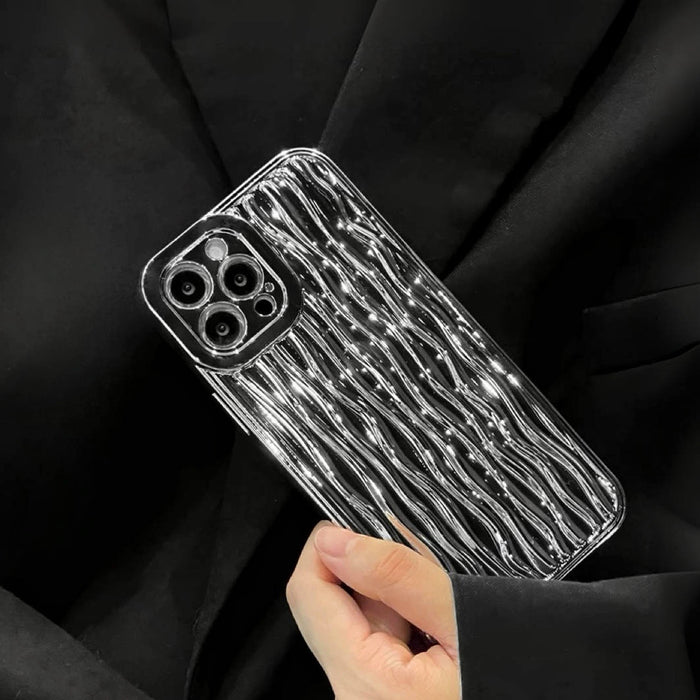 Model holding Silver Water Ripple Case. Dynamic 3D water texture with a shimmering metallic finish.