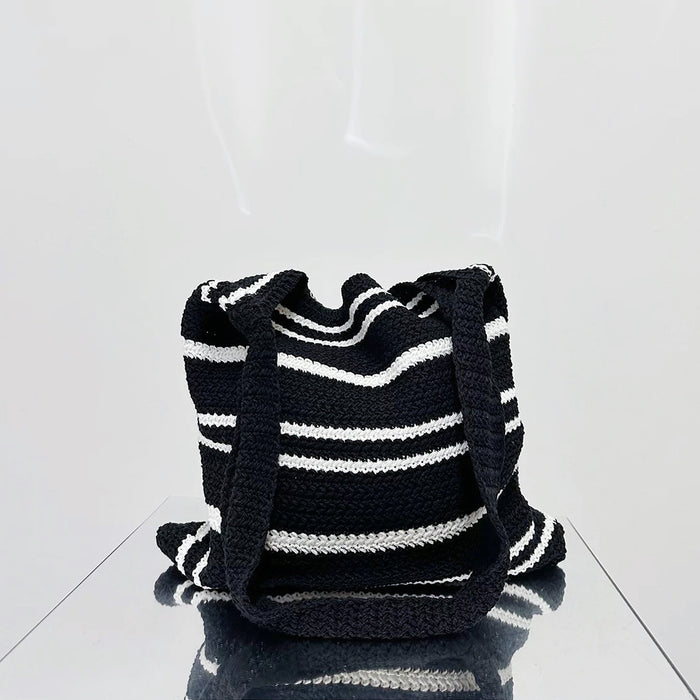 Folded view of black and white Simple Striped Knitted Bag, ideal for errands and gifting.