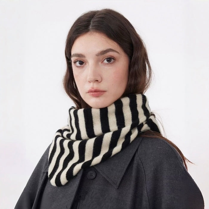 Model wearing a striped wool scarf Simple Striped Triangle Scarf, easy for weekend styling and gifting.