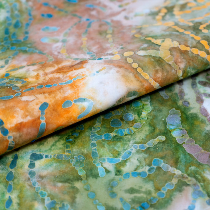 SINGER® Fabric 100% Cotton Batik Collection 42 inch Wide Green and Orange Leaves Cut by the Yard