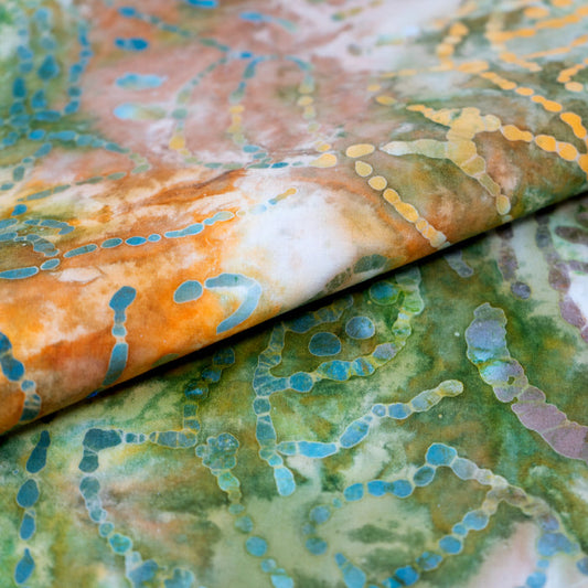 SINGER® Fabric 100% Cotton Batik Collection 42 inch Wide Green and Orange Leaves Cut by the Yard