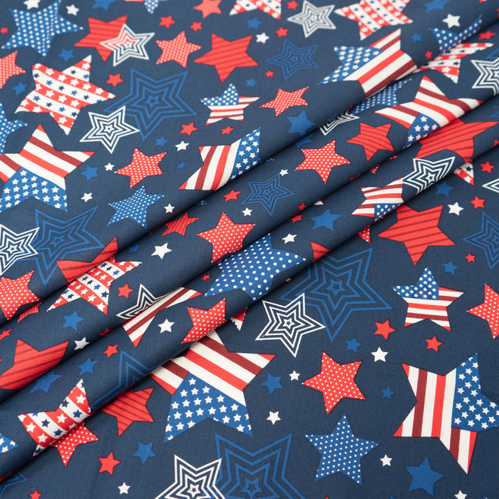 SINGER® Fabric, 100% Cotton, Stars Allover On Navy, Cut by the Yard