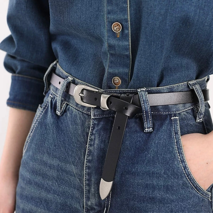 Model wearing the black leather belt with blue denim jeans.