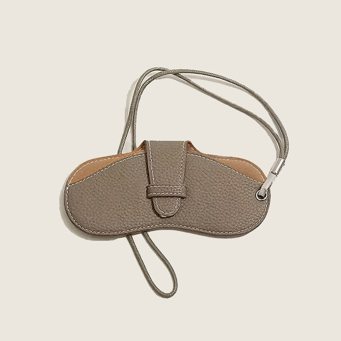 Folded view of Sleek Lychee Glasses Case in gray, easy for travel packing and storage.