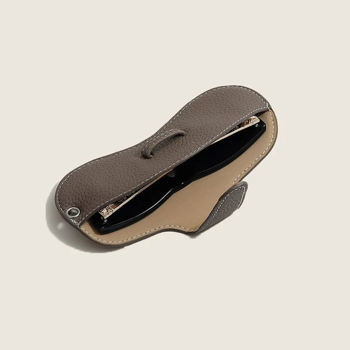 Interior view of grey Sleek Lychee Glasses Case with the flap open..