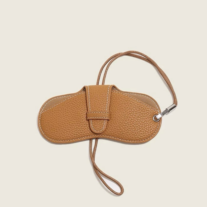 Angled view of Sleek Lychee Glasses Case in khaki, great for closet and drawer organization.