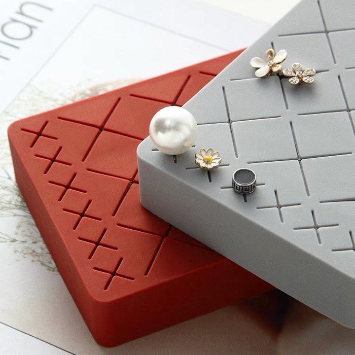 Close-up of Slots Makeup Holder with jewelry inside, ideal for tidy shelves and daily use.