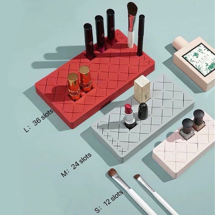Flat lay of  3 Slots Makeup Holder with different colors and sizes.