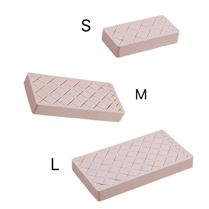 Folded view of pink Slots Makeup Holder in different sizes.