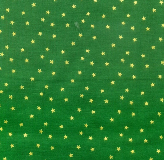 Small Metallic Gold Stars on Green