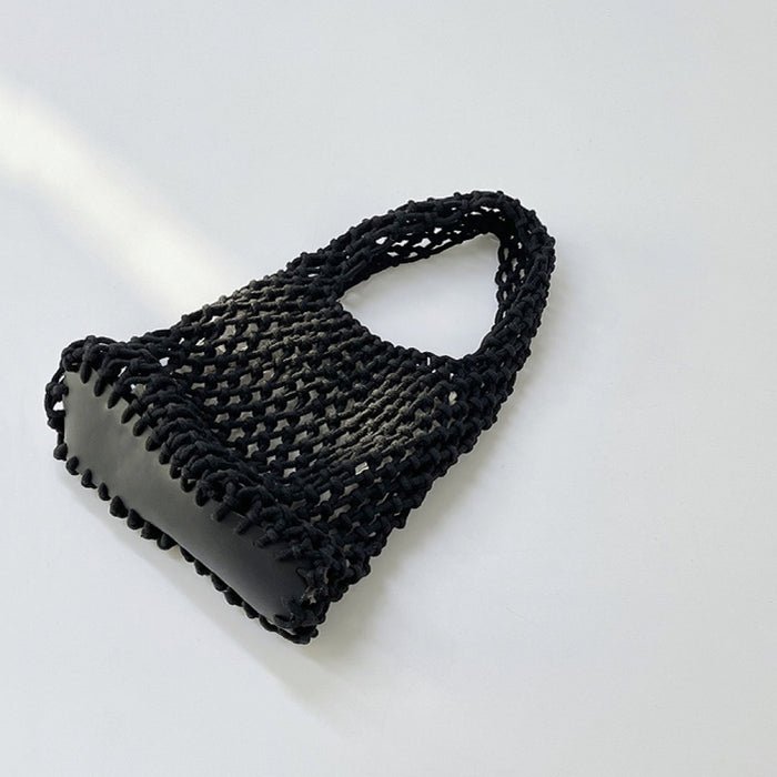 Close-up of Small Multi-Colored Crochet Handbag in black, easy for commuting and weekends.