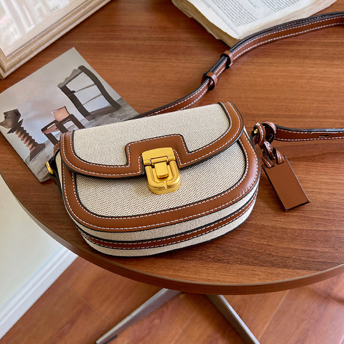 Minimalist vintage flap saddle bag on a cafe table; perfect forurban life.