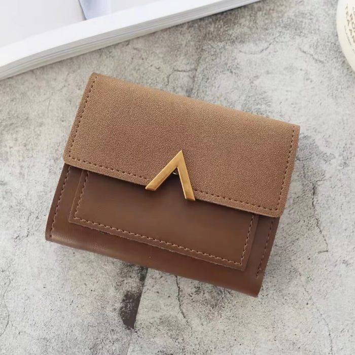 Close-up of Small Wallet With Nubuck Leather Flap in brown, great for everyday carry and travel.