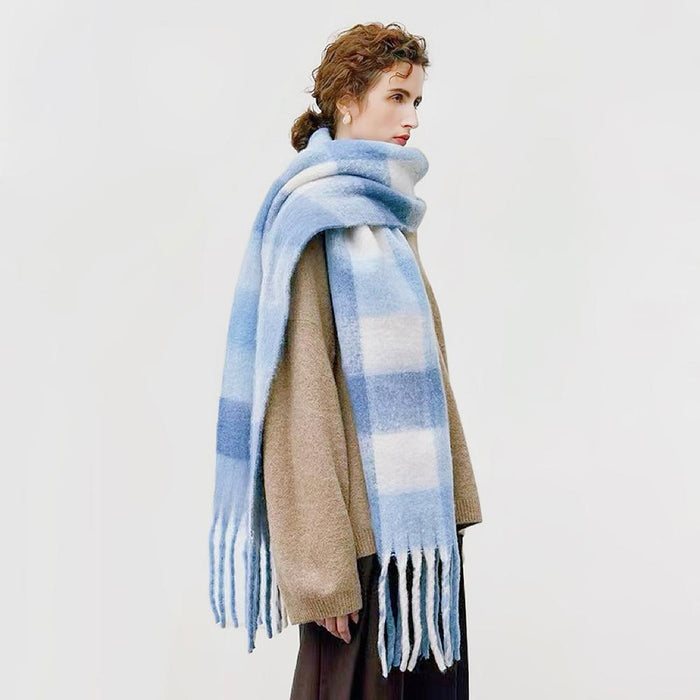 Model wearing a plaid polyester scarf in teal, easy for weekend styling and gifting.