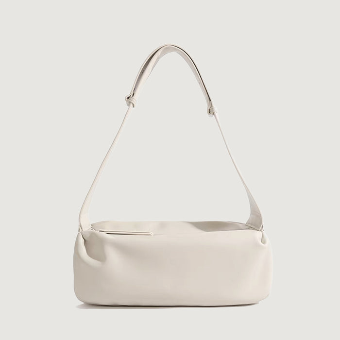 Folded view of Soft Leather Baguette Bag in white, easy for commuting and weekends.