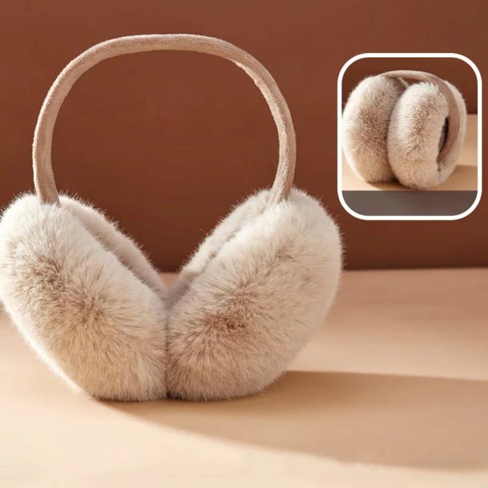 Flat lay of Fluffy Earmuffs in camel; lightweight and foldable winter gear for travel.